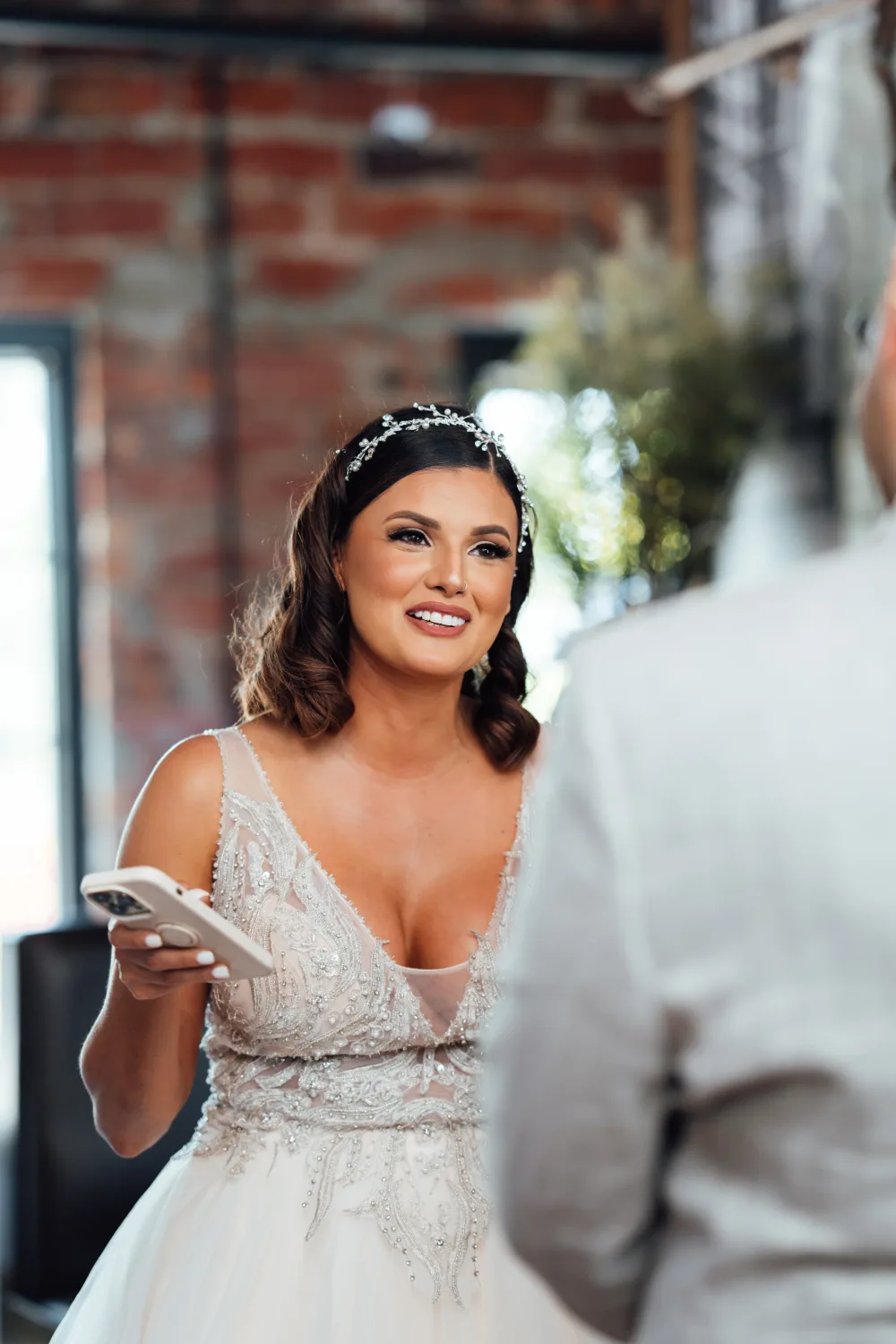 Bridal makeup with defined eyes and soft waves