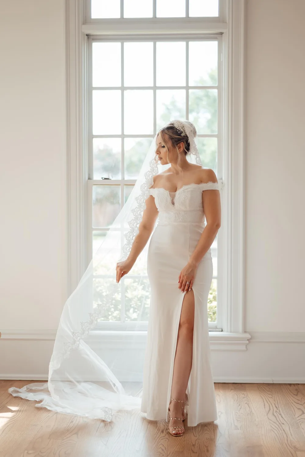 Full bridal look with an updo and veil